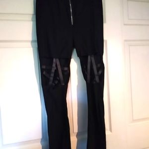 Black pants with star knees